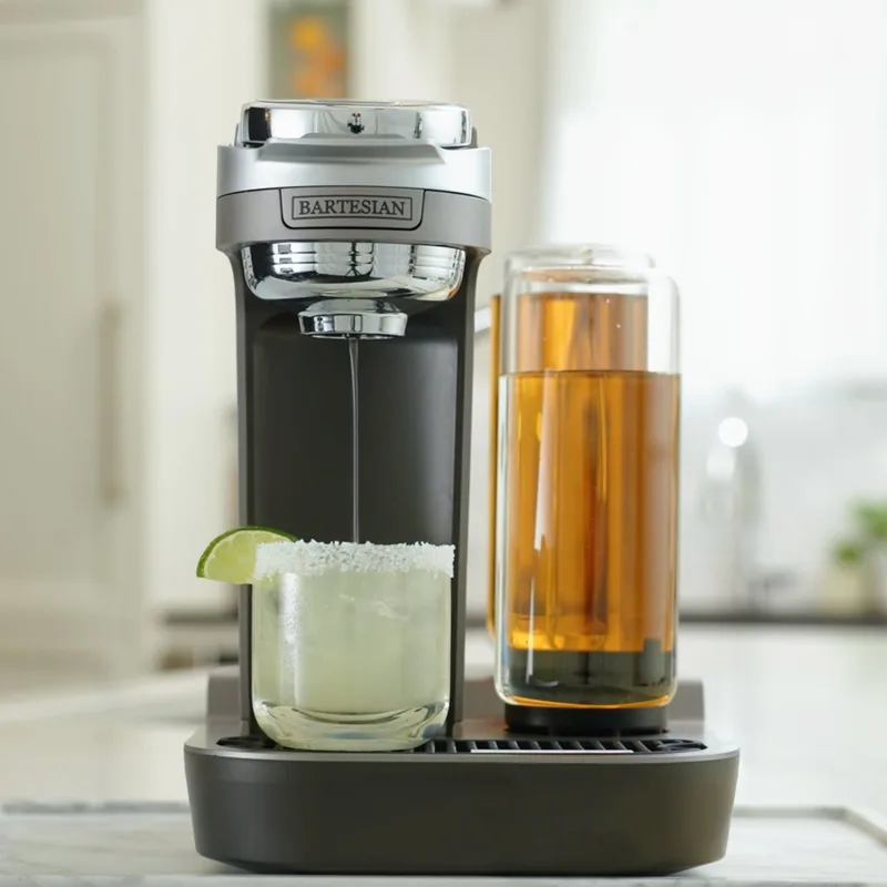 Bartesian Duet cocktail machine on a counter with a margarita and an iced tea