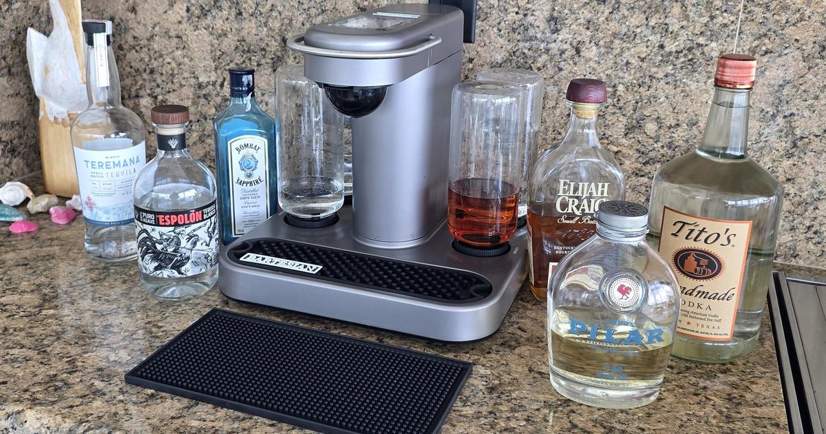 My Bartesian Premier on a granite countertop with the six bottles I pour: Teremana and Espolon tequila, Bombay Sapphire gin, Elijah Craig bourbon, Papa's Pilar rum and Tito's vodka